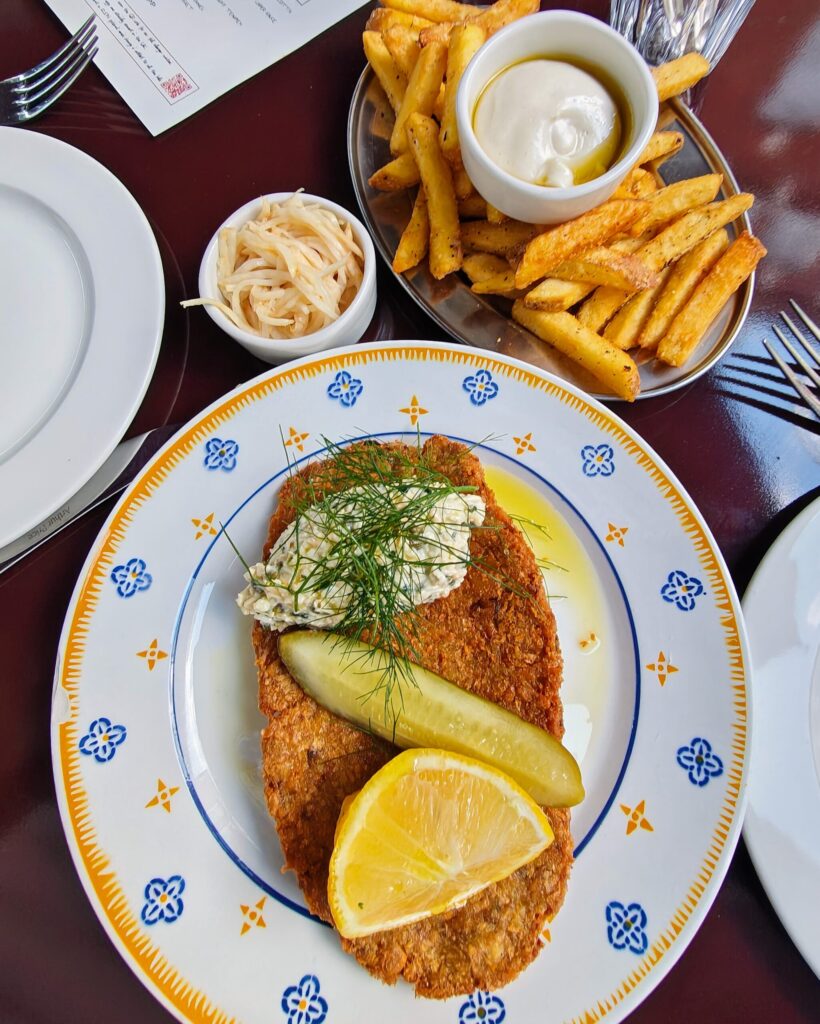 Celeriac Schnitzel - Grilled pickles and herb and caper sauce at Holy Carrot Bistro