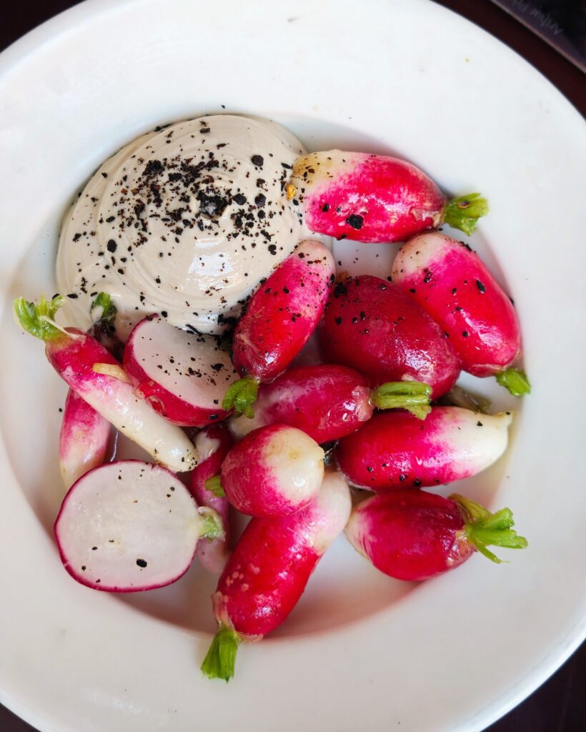 New Season Radishes with whipped tahini at Holy Carrot Bistro