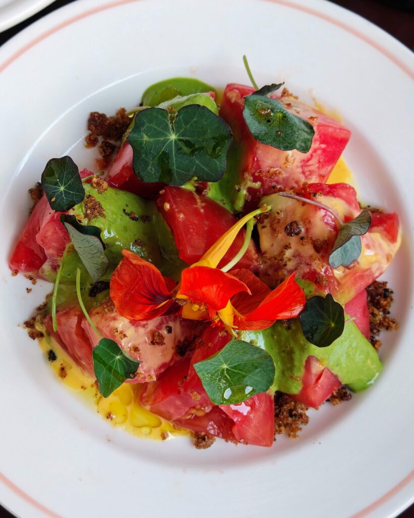 New Season Tomato - Pangrattato, Green Goddess dressing and nasturtium at Holy Carrot Bistro